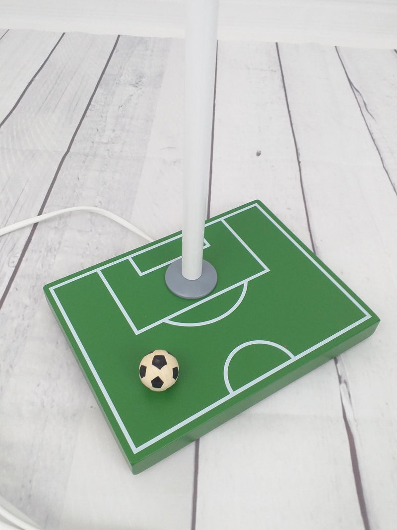 Campo de fútbol con lectura de mesa