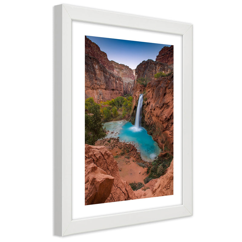 Picture in white frame, Blue waterfall among the rocks