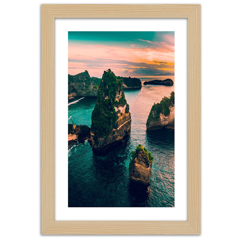 Picture in natural frame, Rocks in the turquoise ocean