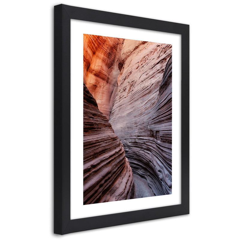 Picture in black frame, Pass between the rocks