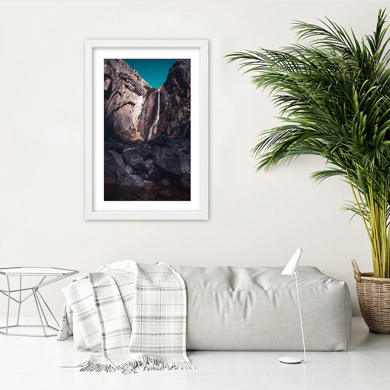 Picture in white frame, Waterfall among high rocks