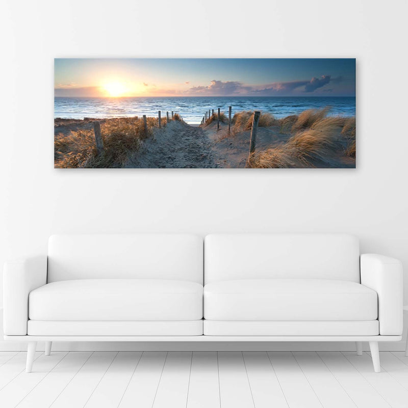 Canvas print, Sunset on a beach by the sea