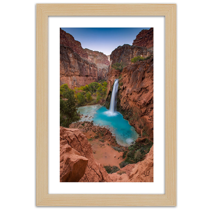 Picture in natural frame, Blue waterfall among the rocks