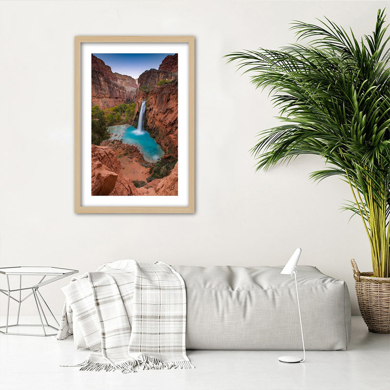 Picture in natural frame, Blue waterfall among the rocks