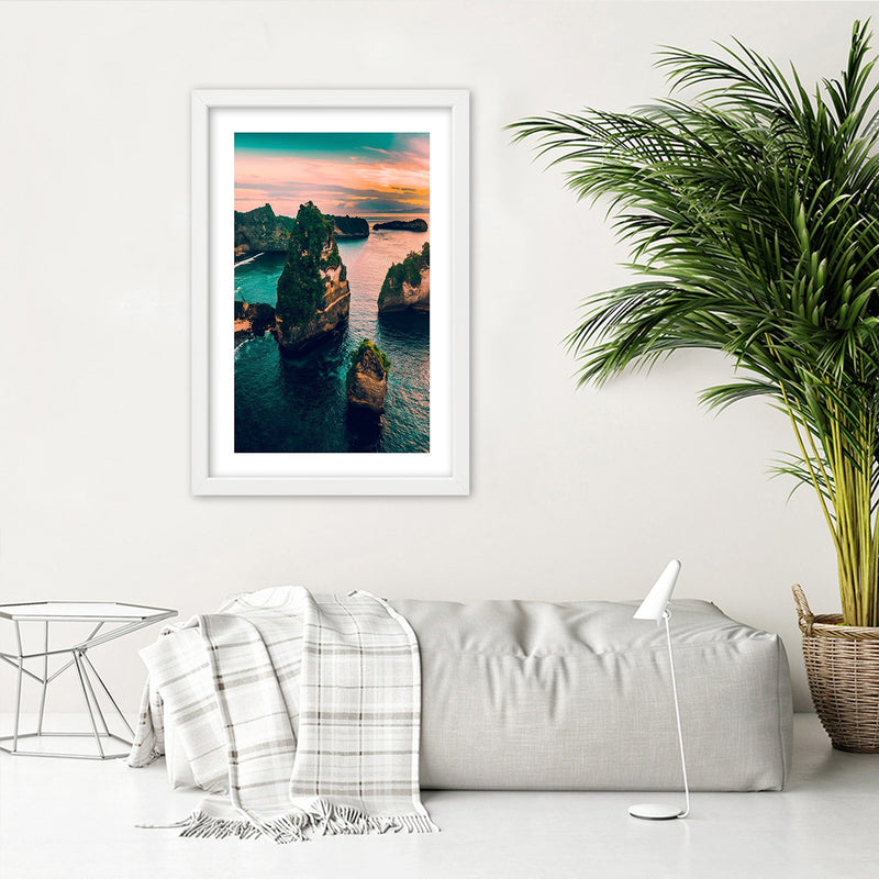 Picture in white frame, Rocks in the turquoise ocean