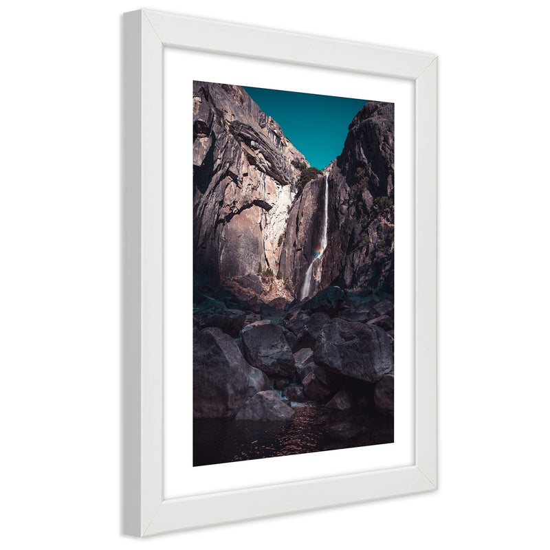 Picture in white frame, Waterfall among high rocks