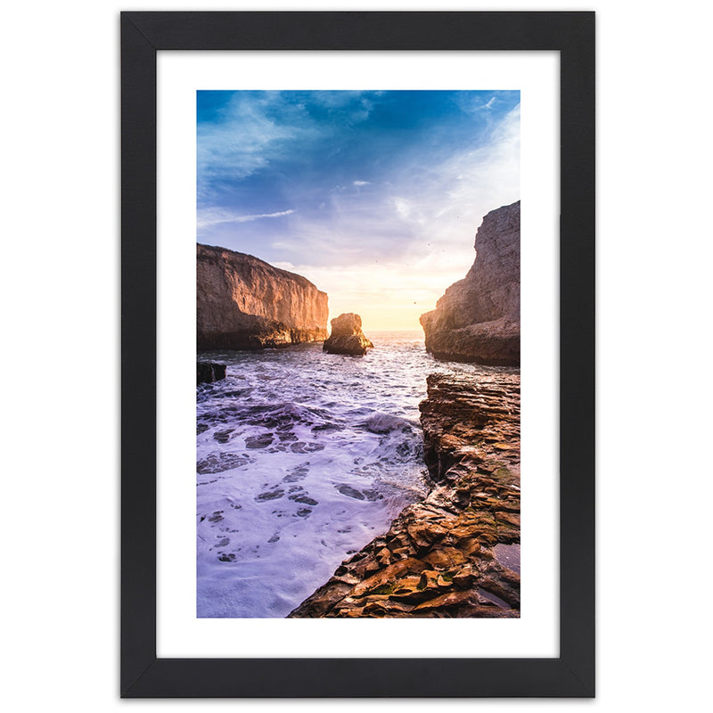 Picture in black frame, Ocean and rocks